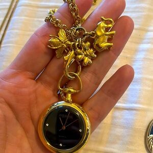 Vintage collector’s piece Joan Rivers 30” gold pocket watch w/ charms bee